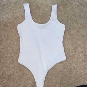 White body suit- never worn